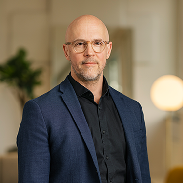 Magnus Sahlgren in a suit looking at the camera - profile picture